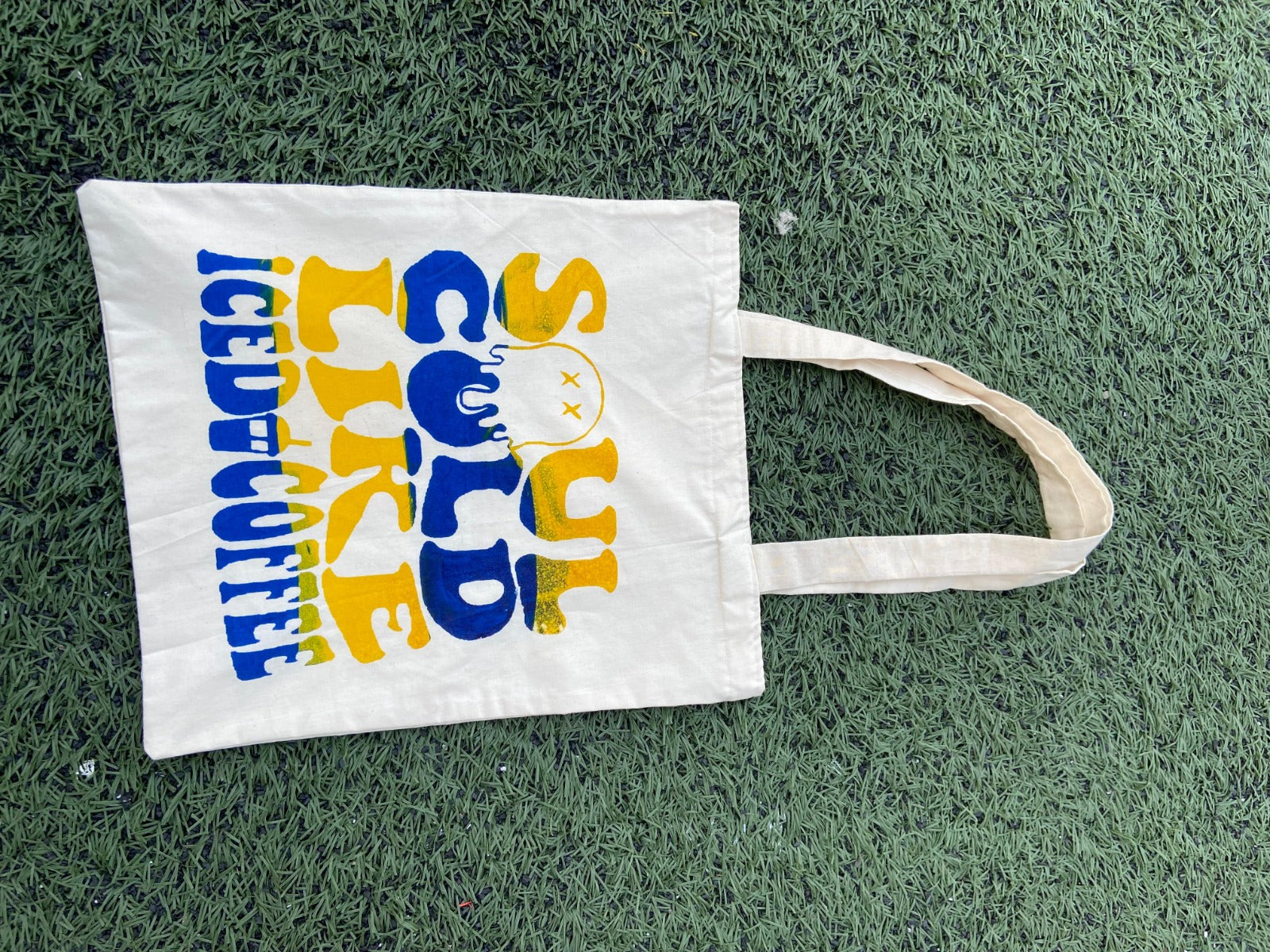 Soul Cold Like Iced Coffee tote in blue and yellow