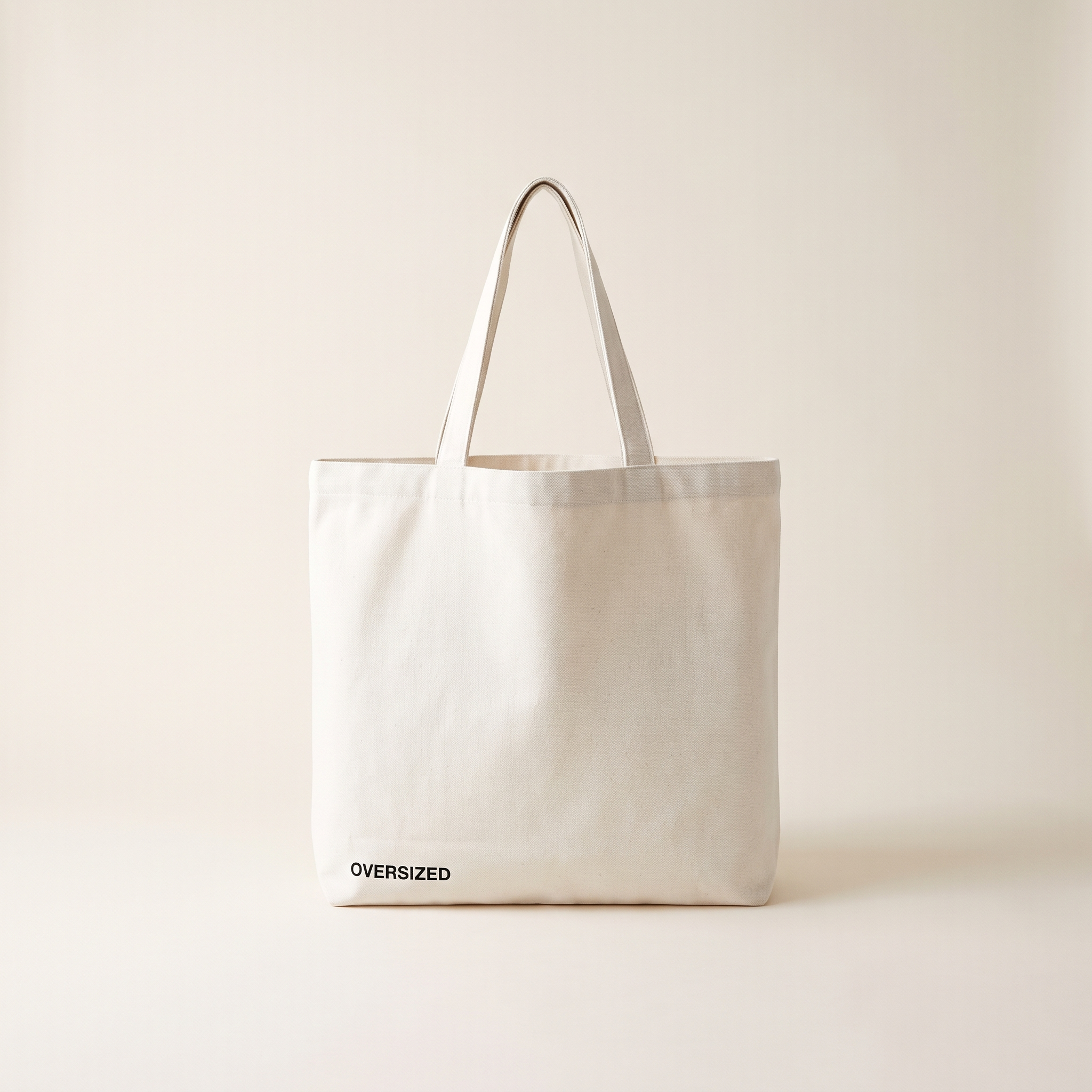 Signature Tote in white canvas with OVERSIZED wordmark